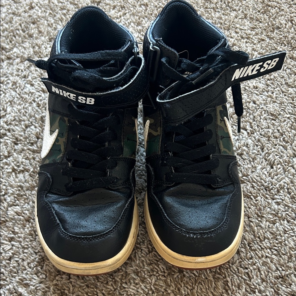 Nike Kids Black High-Top Sneakers with Camo Panels and White Swoosh